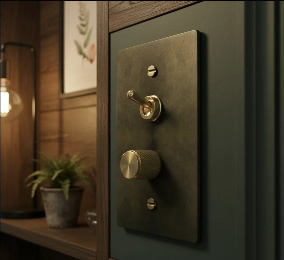 Toggle and dimmer combo switch plate with antique bronze brass switch plate on a wall