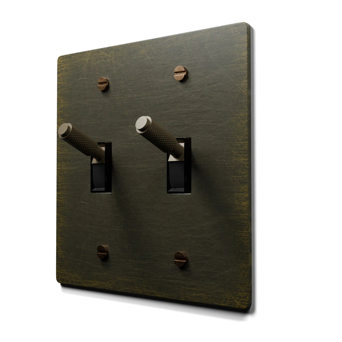 Antique brass  double toggle switch plate on a white background
