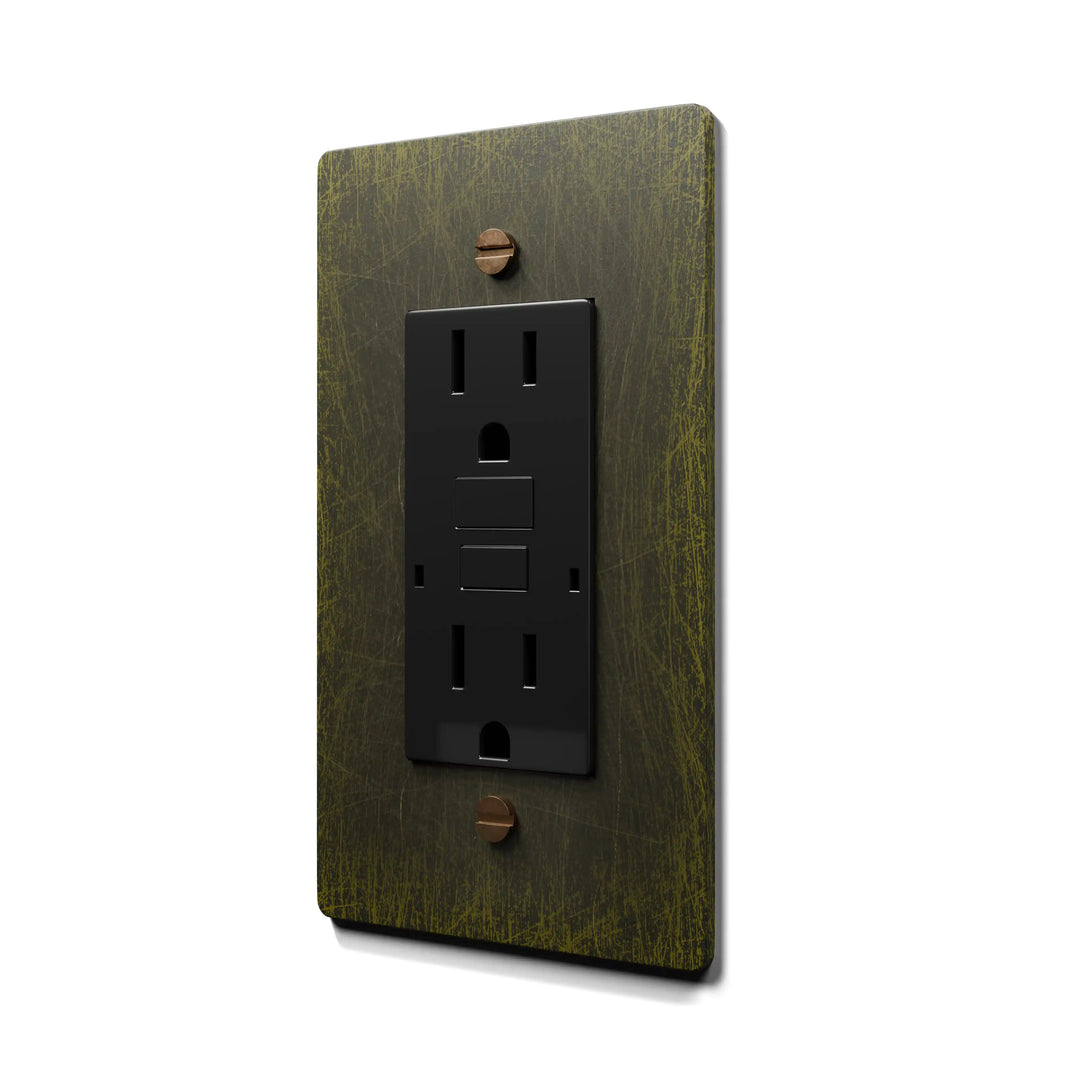 GFCI electrical outlet with antique brass plate