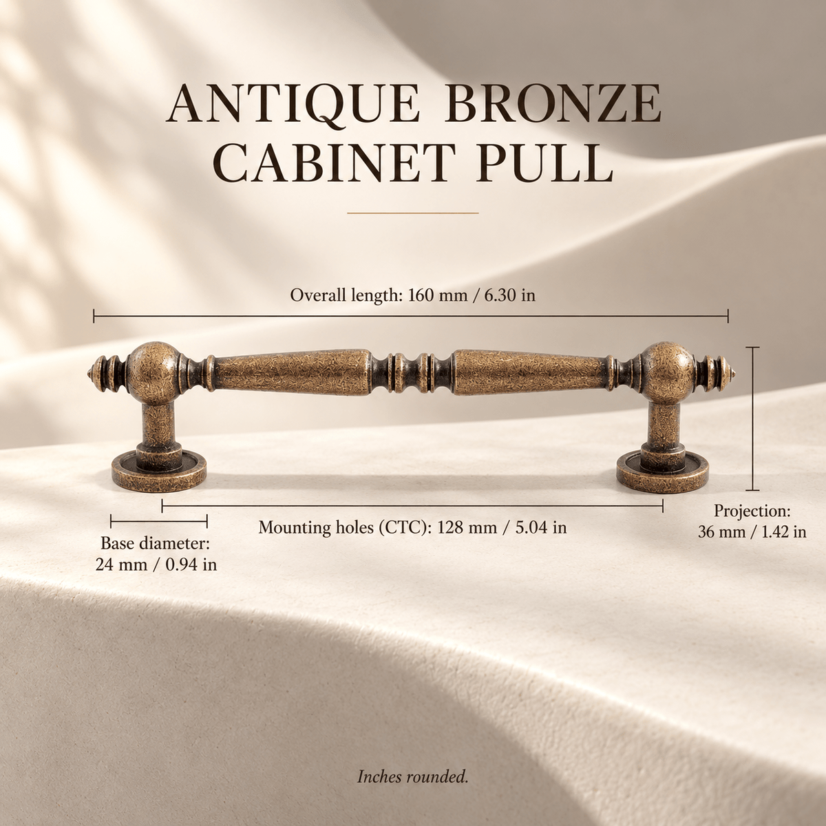 Antique bronze cabinet pull on ivory stone; mounting holes 128 mm / 5.04 in, overall length 160 mm / 6.30 in, projection 36 mm / 1.42 in, base diameter 24 mm / 0.94 in