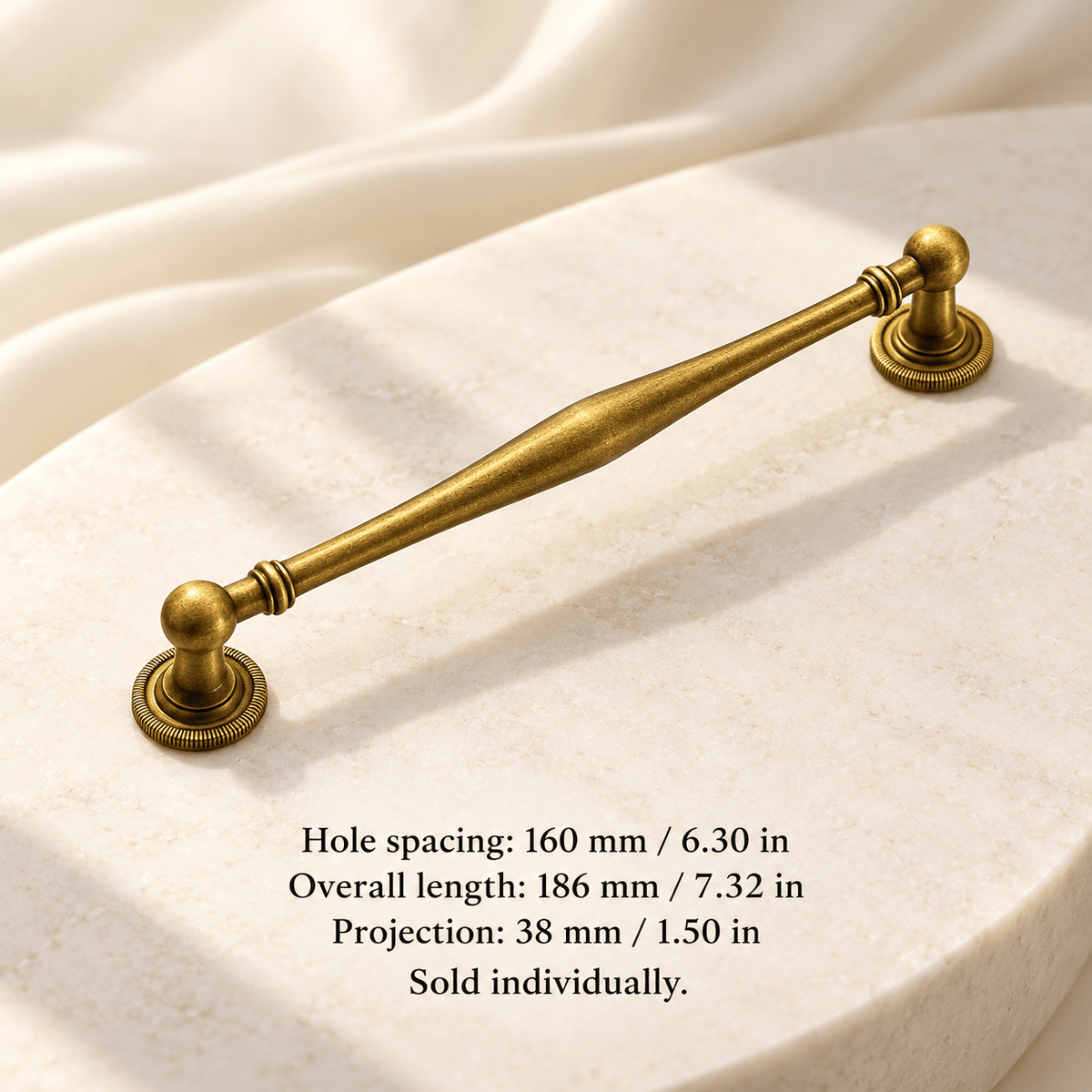 Antique gold 160 mm / 6.30 in CTC — 1 piece; Hole spacing: 160 mm / 6.30 in; Overall length: 186 mm / 7.32 in; Projection: 38 mm / 1.50 in; sold individually on ivory stone studio background