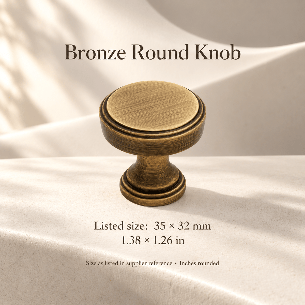 Bronze round knob; listed size 35 x 32 mm / 1.38 x 1.26 in; ivory studio