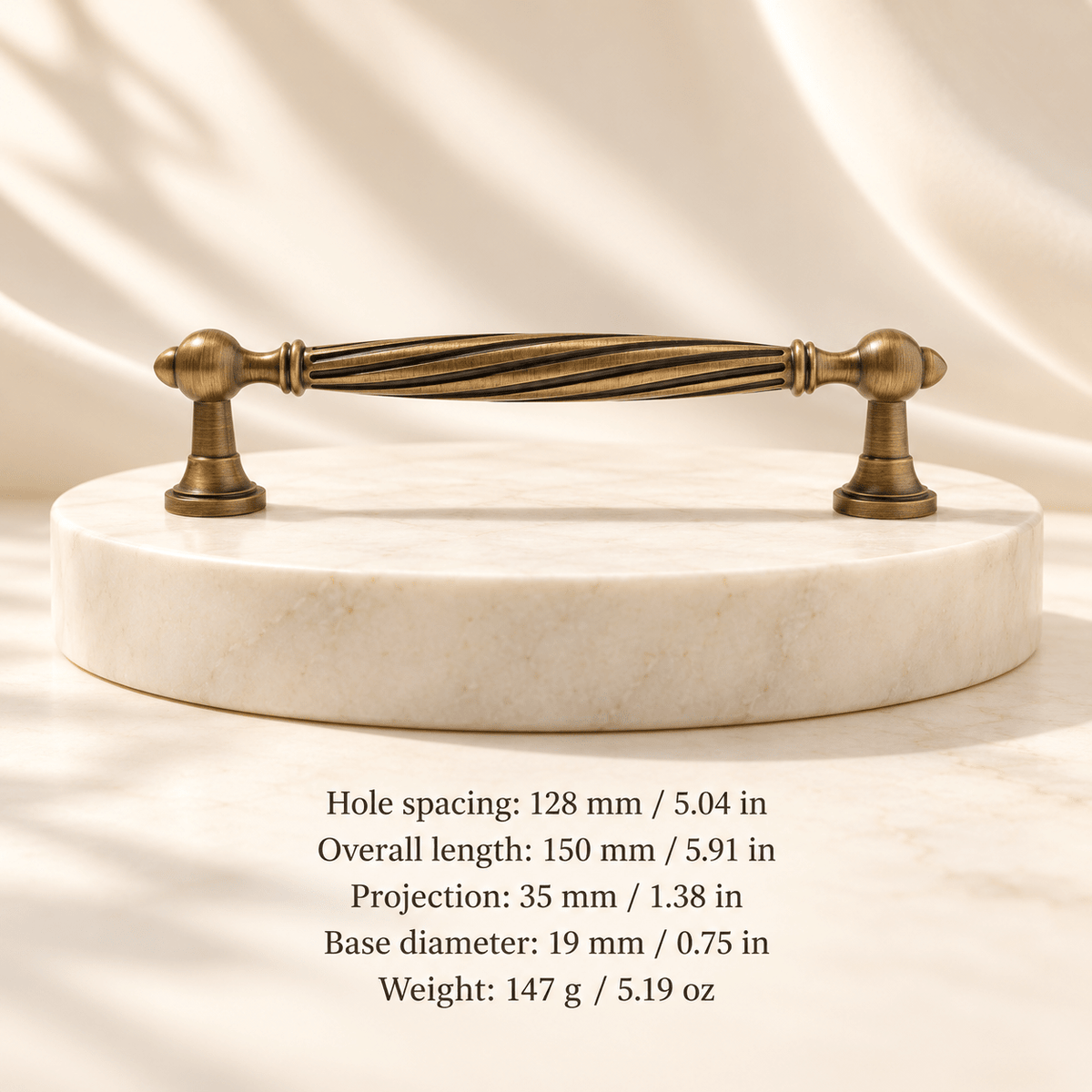 Antique bronze 128 mm / 5.04 in CTC; Hole spacing: 128 mm / 5.04 in; Overall length: 150 mm / 5.91 in; Projection: 35 mm / 1.38 in; Base diameter: 19 mm / 0.75 in; Weight: 147 g / 5.19 oz on ivory stone studio background