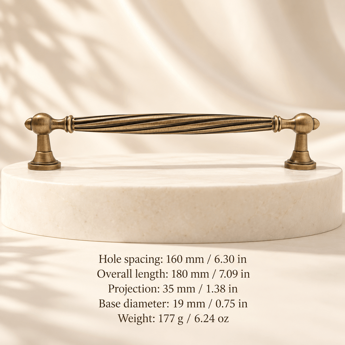 Antique bronze 160 mm / 6.30 in CTC; Hole spacing: 160 mm / 6.30 in; Overall length: 180 mm / 7.09 in; Projection: 35 mm / 1.38 in; Base diameter: 19 mm / 0.75 in; Weight: 177 g / 6.24 oz on ivory stone studio background