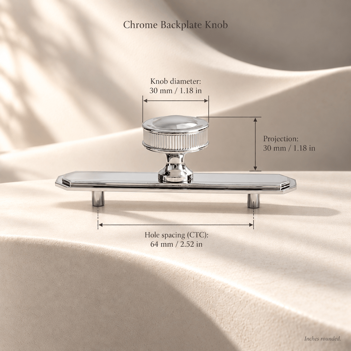 Polished chrome brass cabinet knob on elongated backplate, 30 mm diameter and projection, 64 mm mounting-hole spacing with inch equivalents