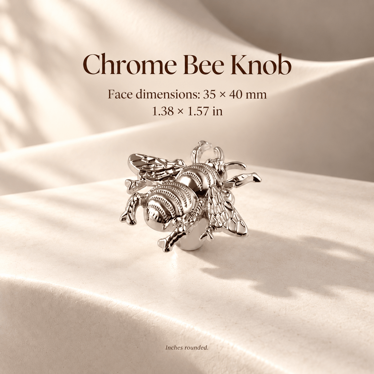 Chrome bee-shaped cabinet knob with 35 by 40 mm / 1.38 by 1.57 inch face dimensions