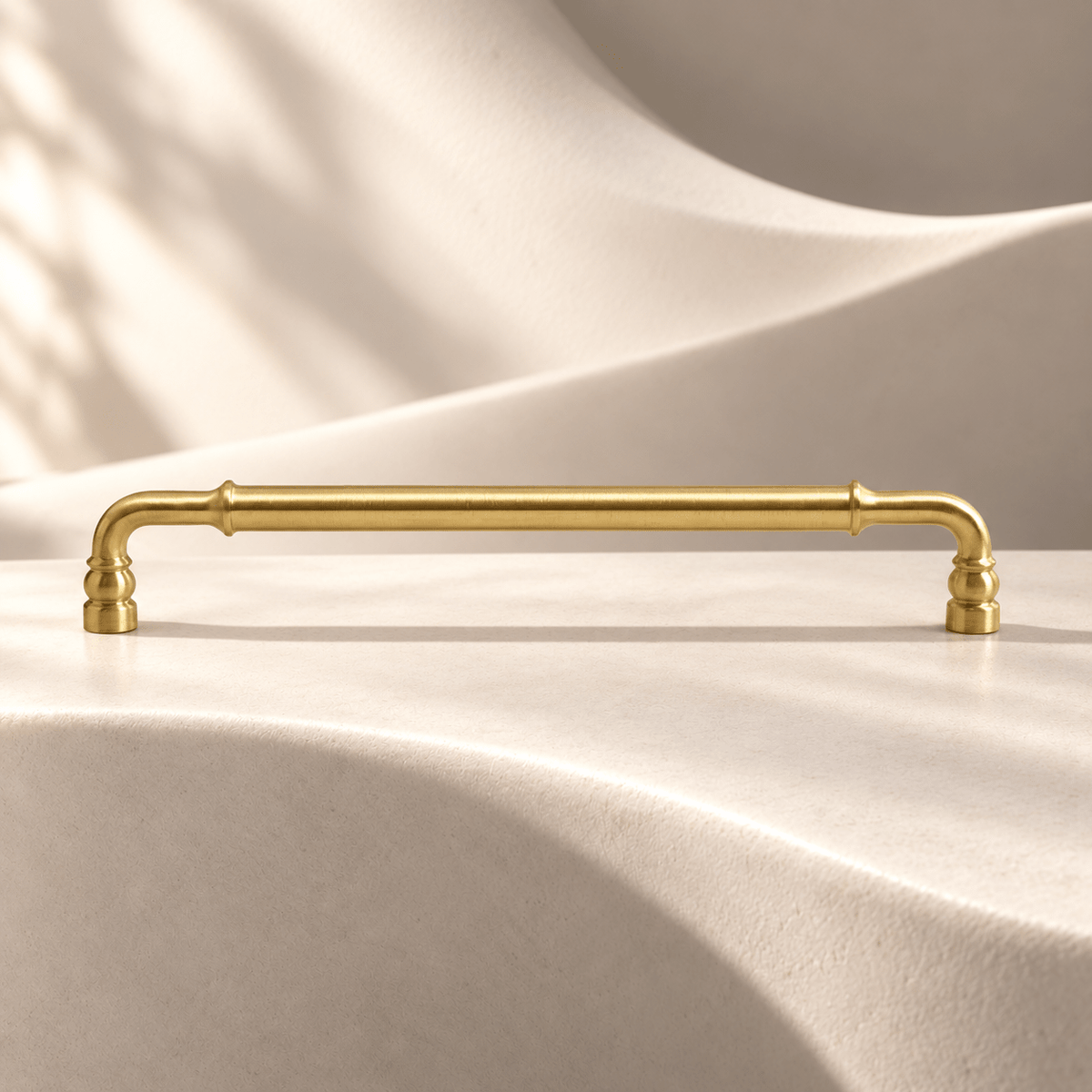 Classic gold 192 mm CTC cabinet pull — Ivory Atelier studio photograph