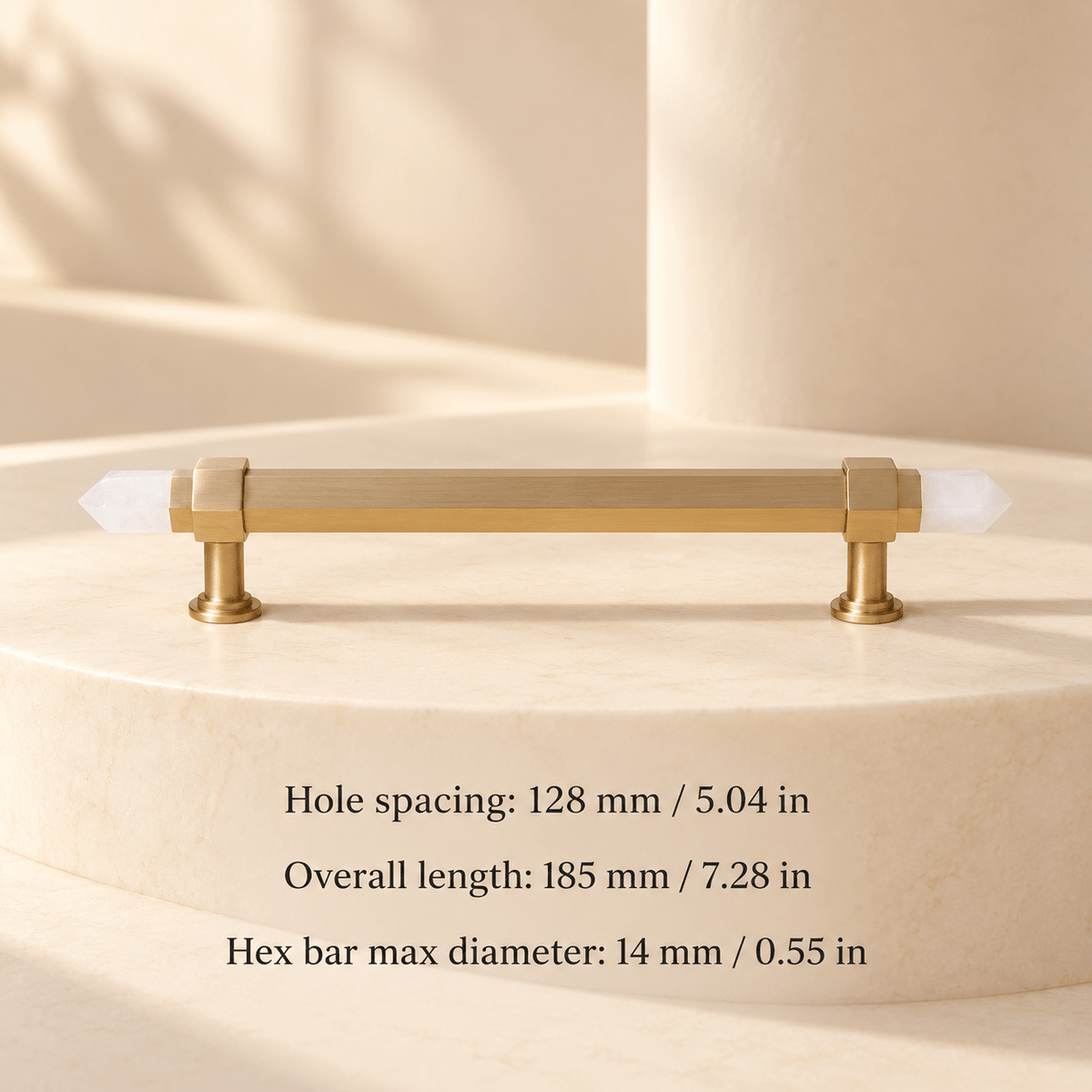 White pointed-end gold cabinet pull — Hole spacing: 128 mm / 5.04 in; Overall length: 185 mm / 7.28 in; Hex bar max diameter: 14 mm / 0.55 in — ivory studio