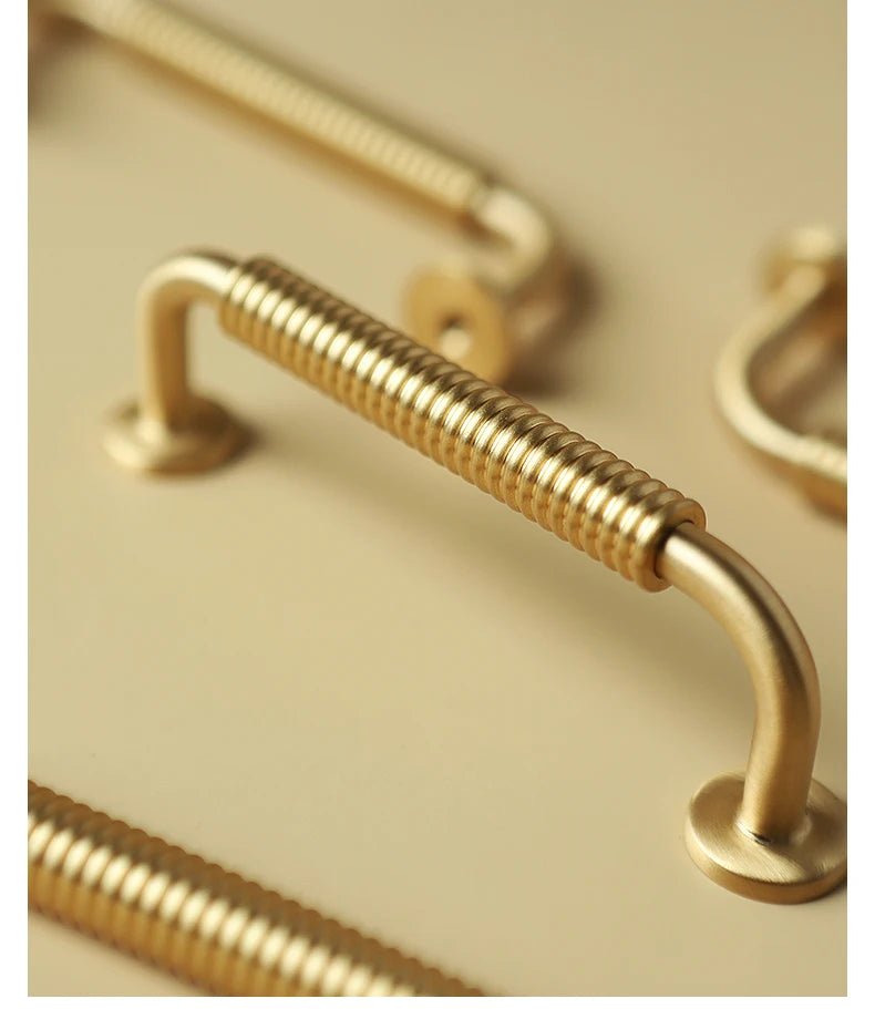 Elegant Thread-Line Brass Pulls for Modern Cabinet Design
