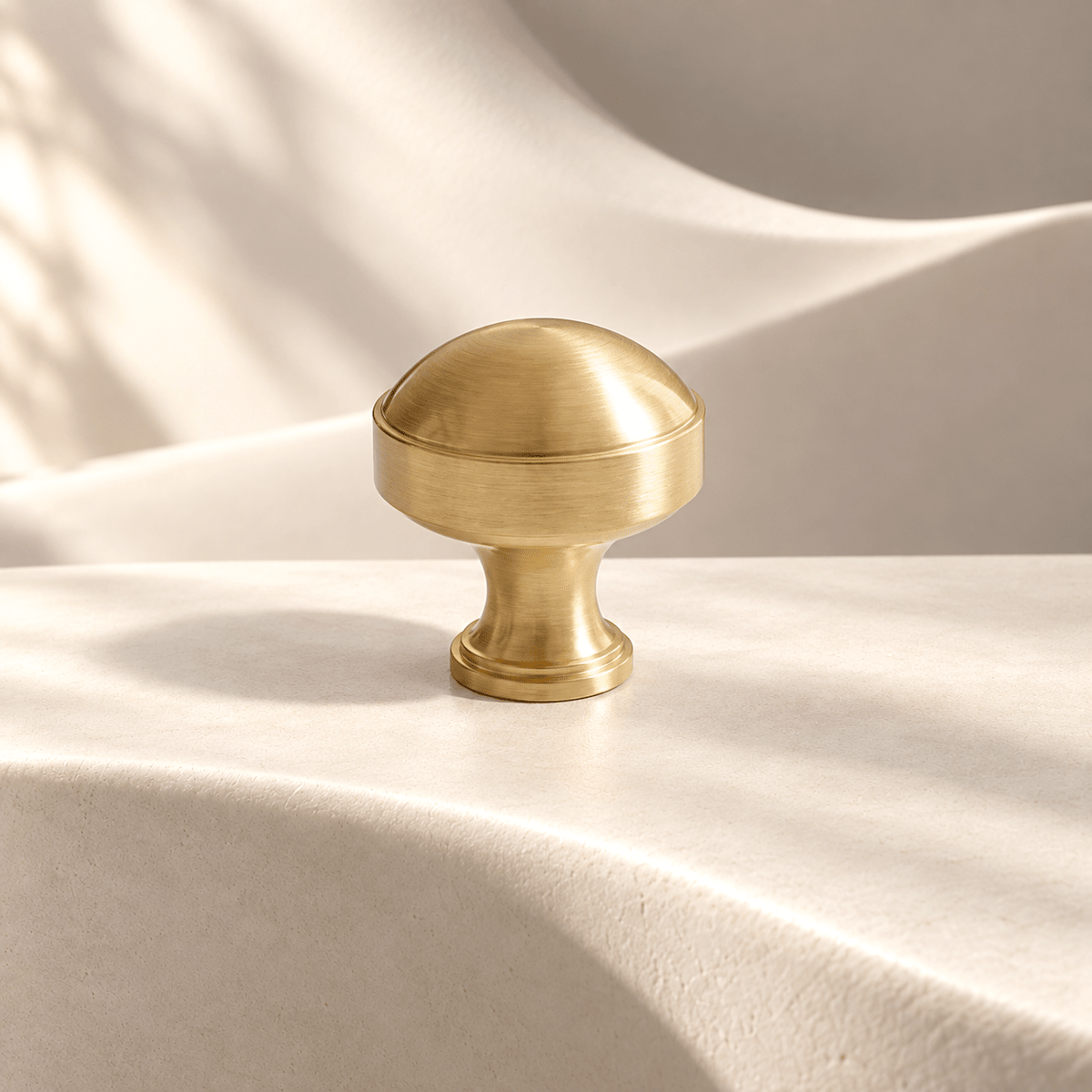 European gold 25 mm domed knob on ivory stone