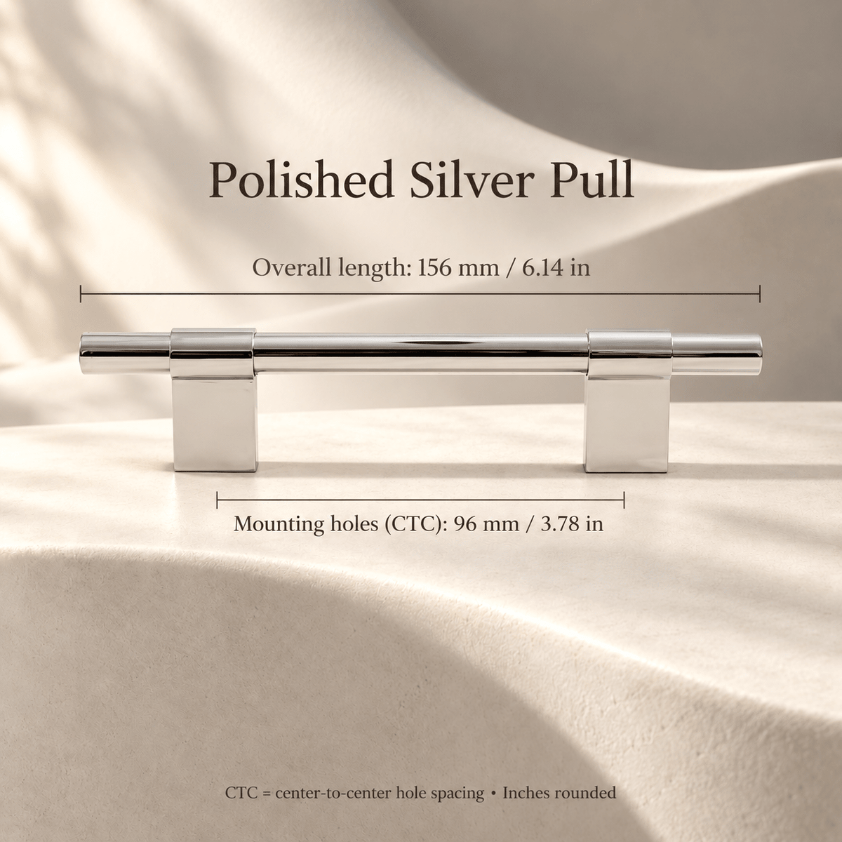 Polished Silver cabinet pull; mounting holes 96 mm / 3.78 in CTC, overall 156 mm / 6.14 in; ivory studio