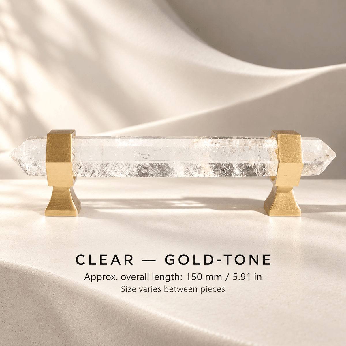 Clear crystal cabinet pull with Gold-tone mounts in ivory studio. Approx. overall length: 150 mm / 5.91 in; Size varies between pieces