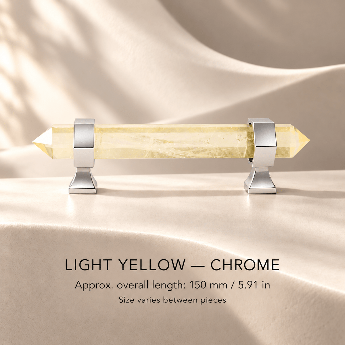 Light yellow crystal cabinet pull with Chrome mounts in ivory studio. Approx. overall length: 150 mm / 5.91 in; Size varies between pieces
