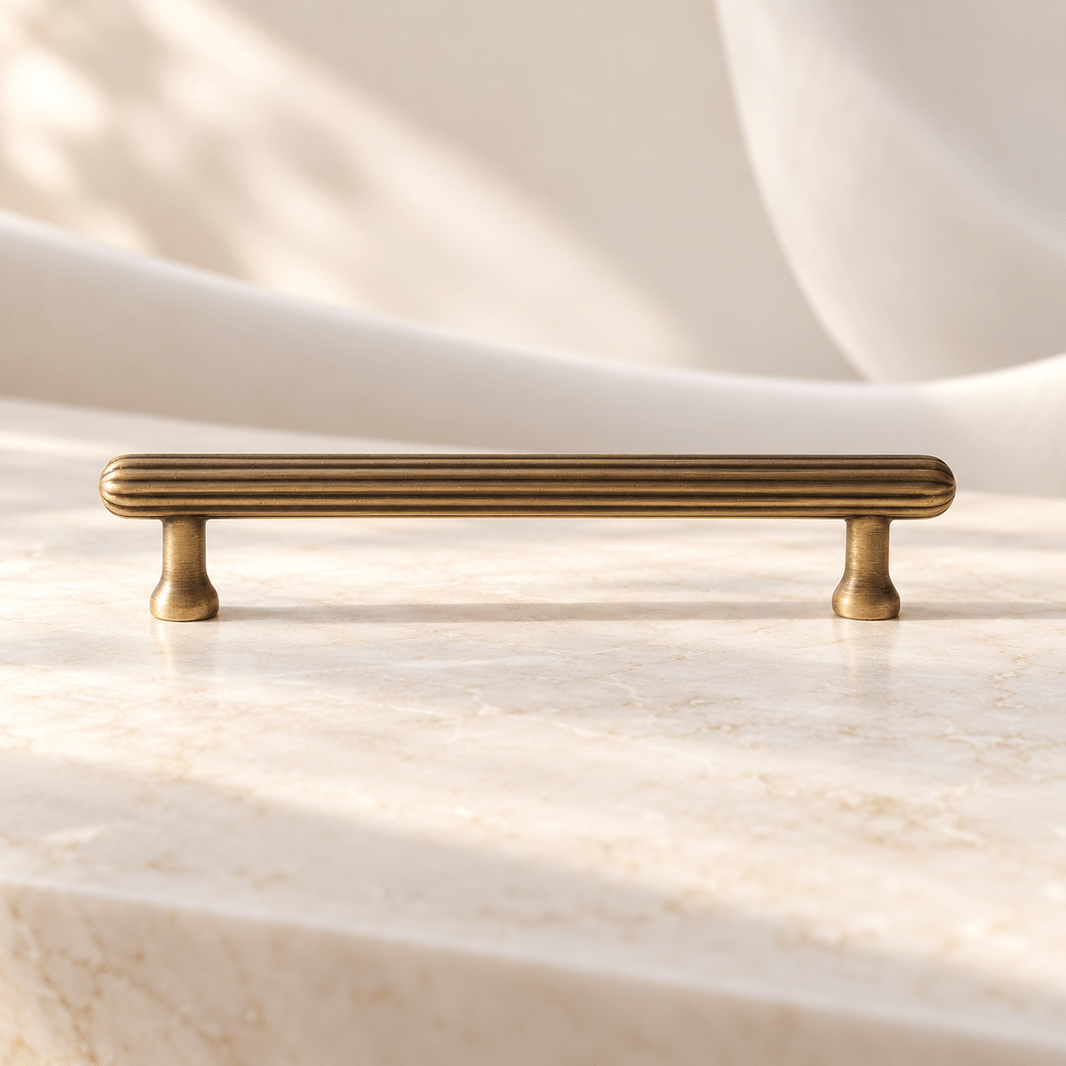 Fluted brass cabinet pull 128 mm hole spacing, antique finish, ivory stone studio