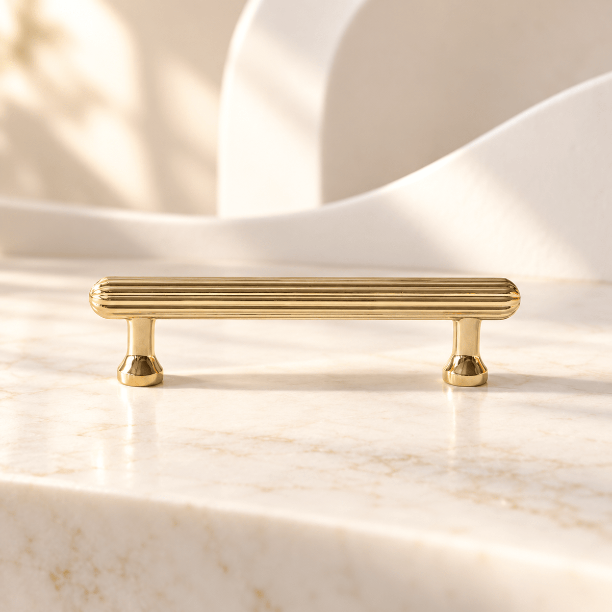 Fluted brass cabinet pull 96 mm hole spacing, bright gold, ivory stone studio