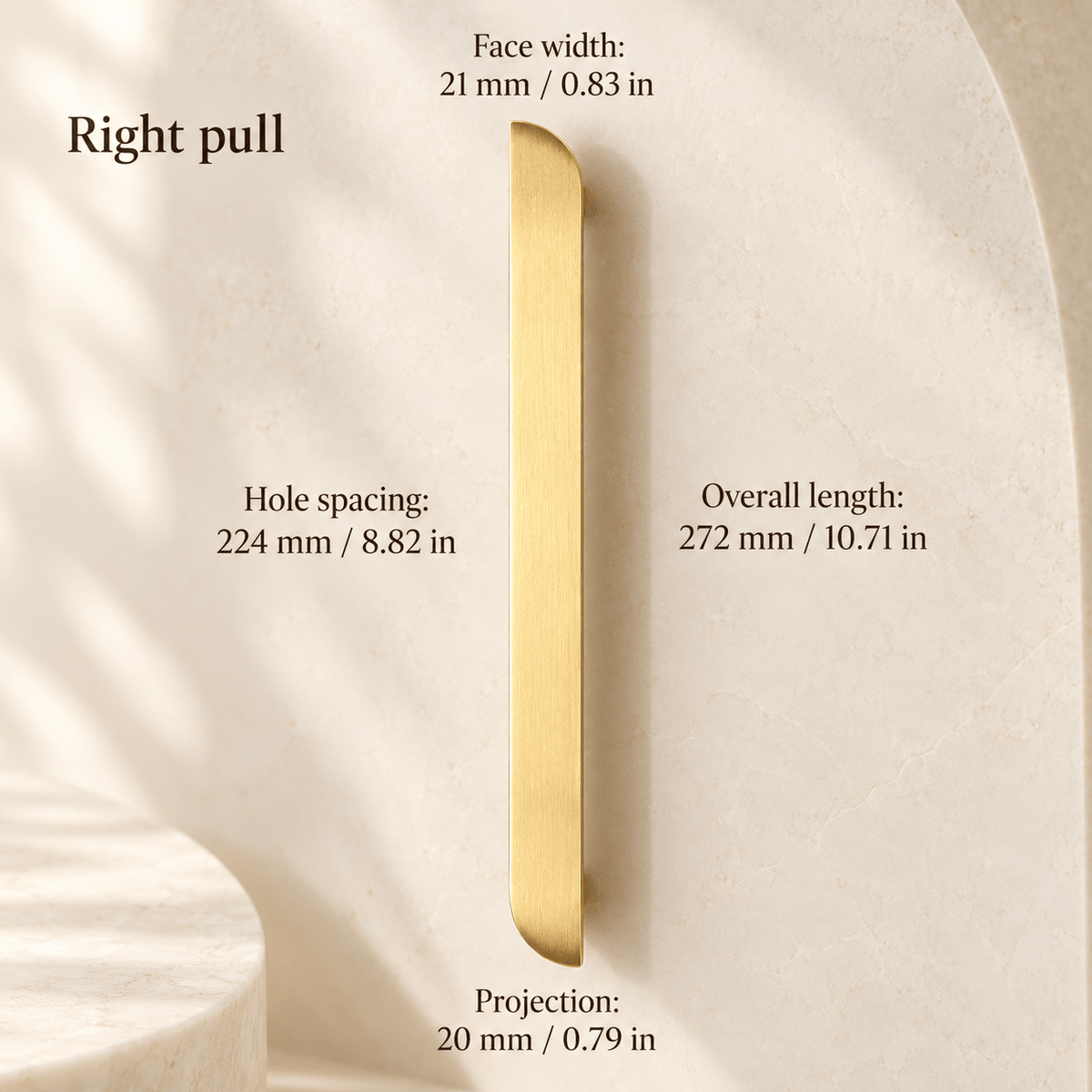 Gold asymmetric right cabinet pull in ivory studio. Hole spacing: 224 mm / 8.82 in; Overall length: 272 mm / 10.71 in; Face width: 21 mm / 0.83 in; Projection: 20 mm / 0.79 in