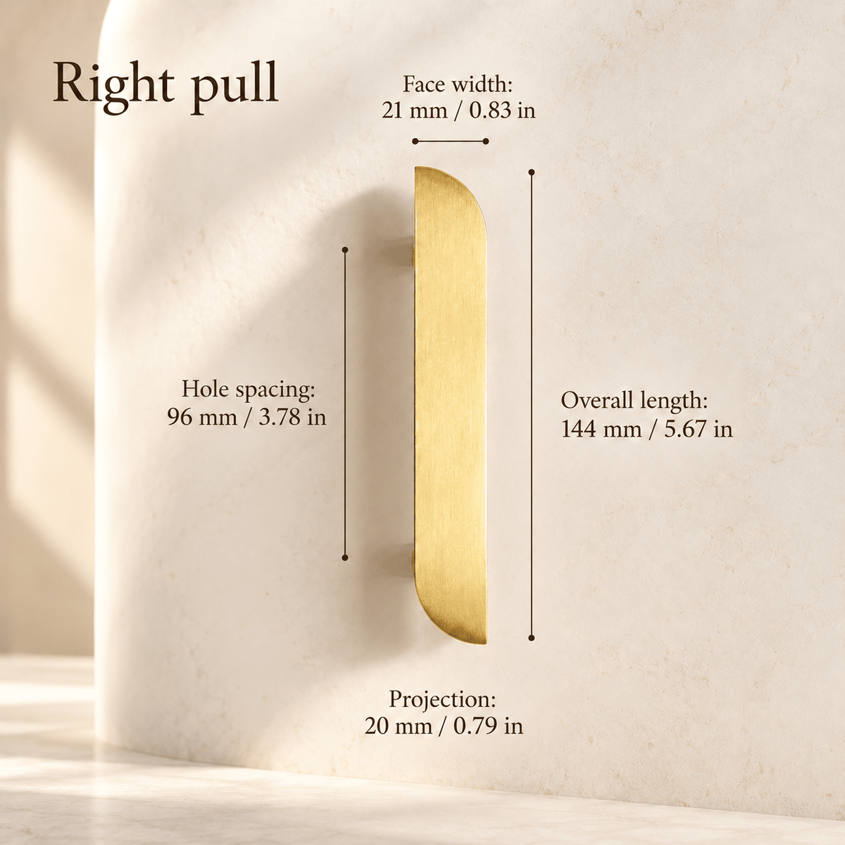 Gold asymmetric right cabinet pull in ivory studio. Hole spacing: 96 mm / 3.78 in; Overall length: 144 mm / 5.67 in; Face width: 21 mm / 0.83 in; Projection: 20 mm / 0.79 in