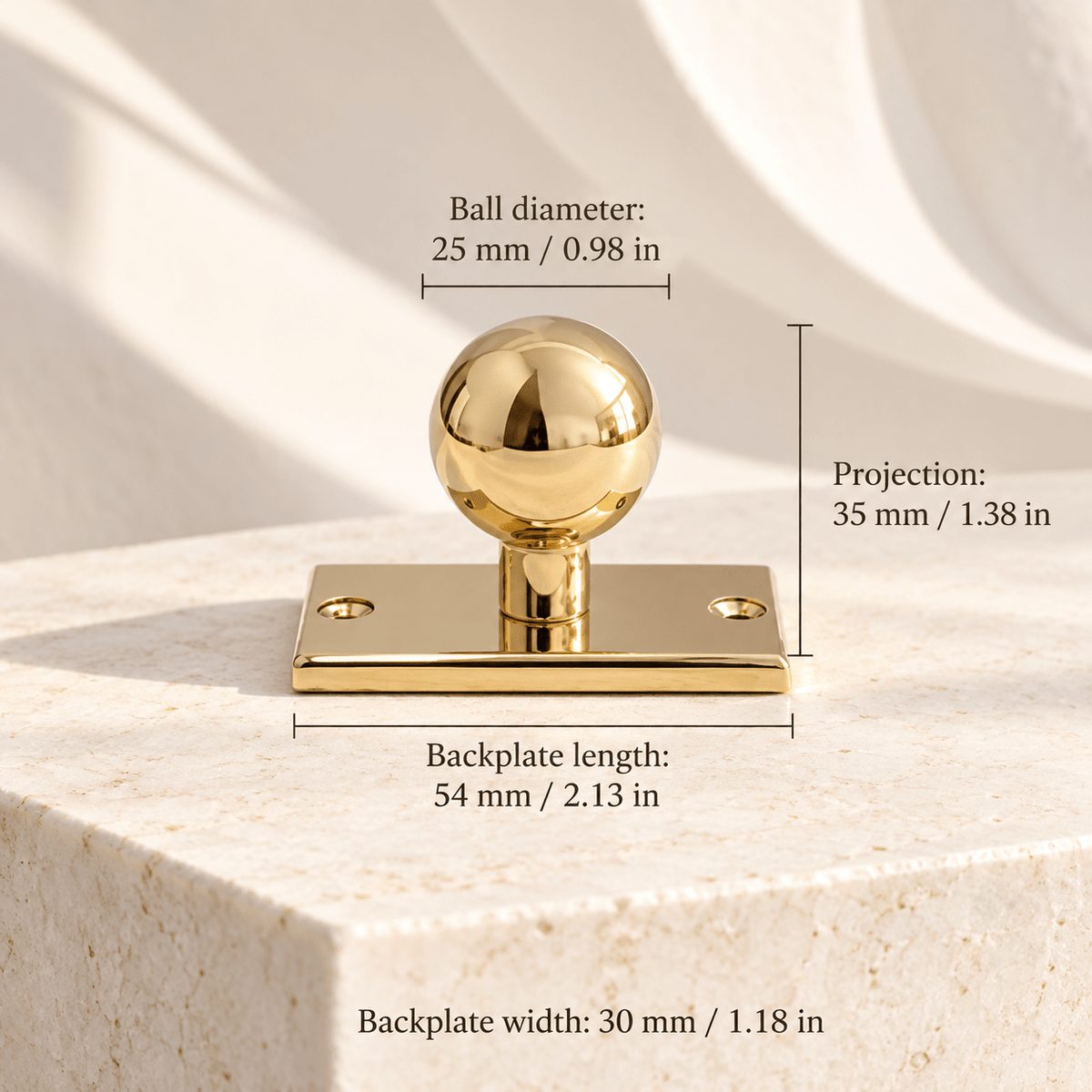 Polished gold brass ball cabinet knob with rectangular backplate, individual dimensions in millimeters and inches