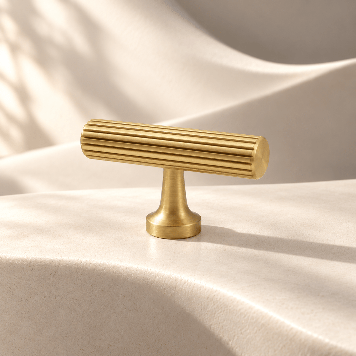 Gold brass T-knob, 50 mm overall, ivory stone studio