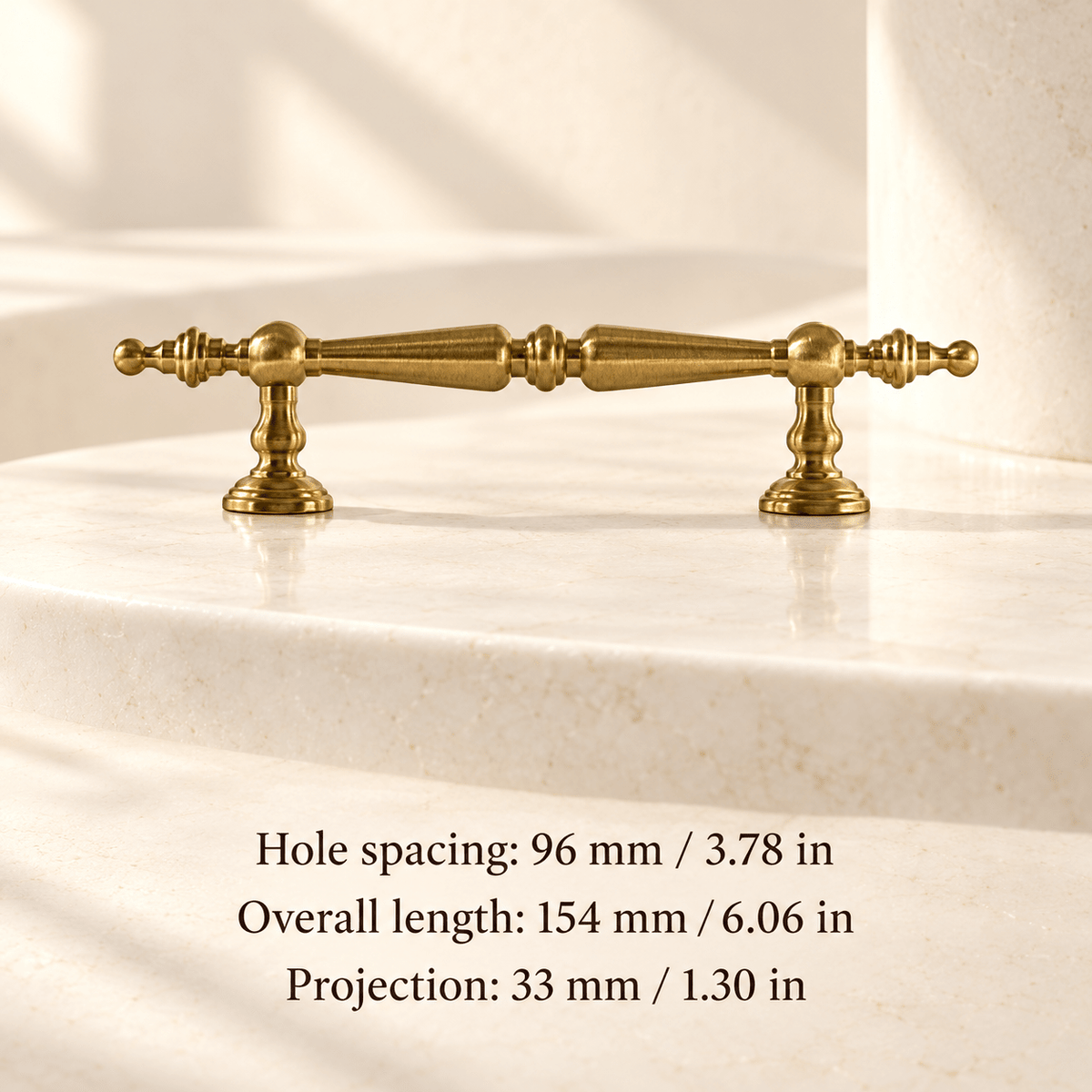 Classic gold finial cabinet pull in ivory studio. Hole spacing: 96 mm / 3.78 in; Overall length: 154 mm / 6.06 in; Projection: 33 mm / 1.30 in