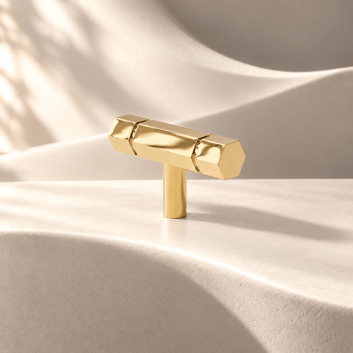 Gold hexagon 50 mm T-knob on ivory stone