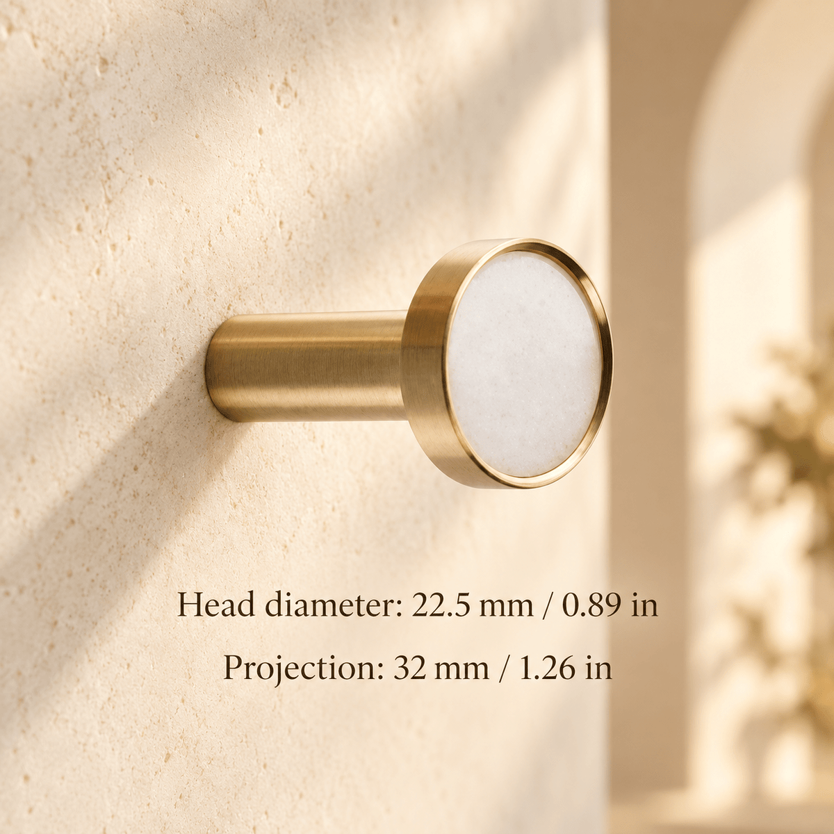 White round knob with gold rim in ivory studio. Head diameter: 22.5 mm / 0.89 in; Projection: 32 mm / 1.26 in