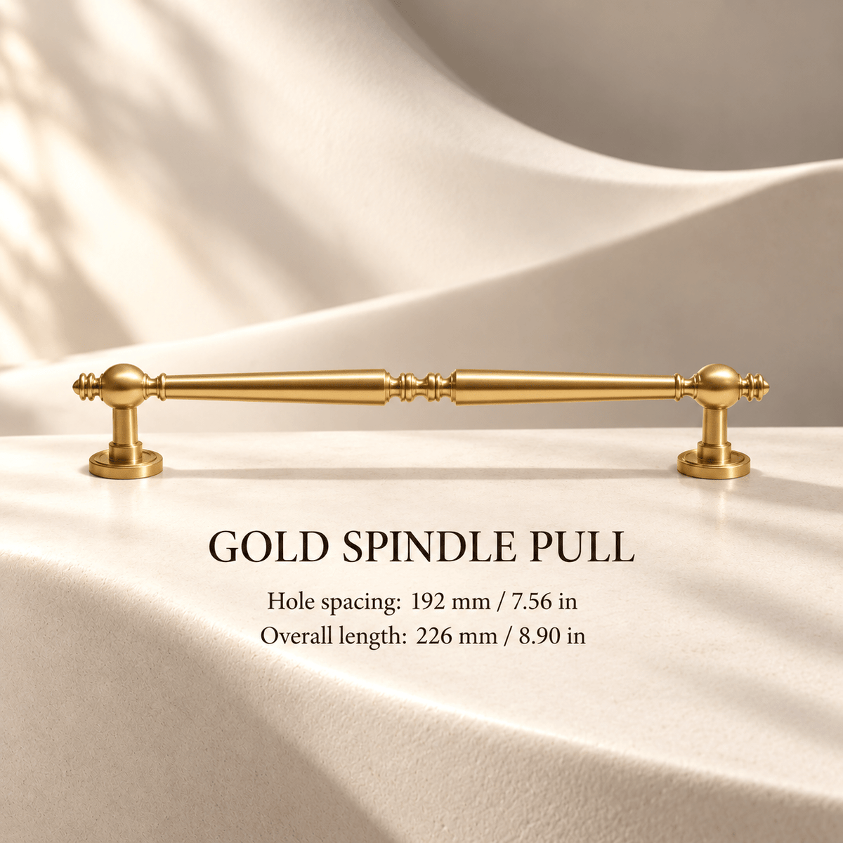 Gold tapered spindle pull — Hole spacing: 192 mm / 7.56 in; Overall length: 226 mm / 8.90 in
