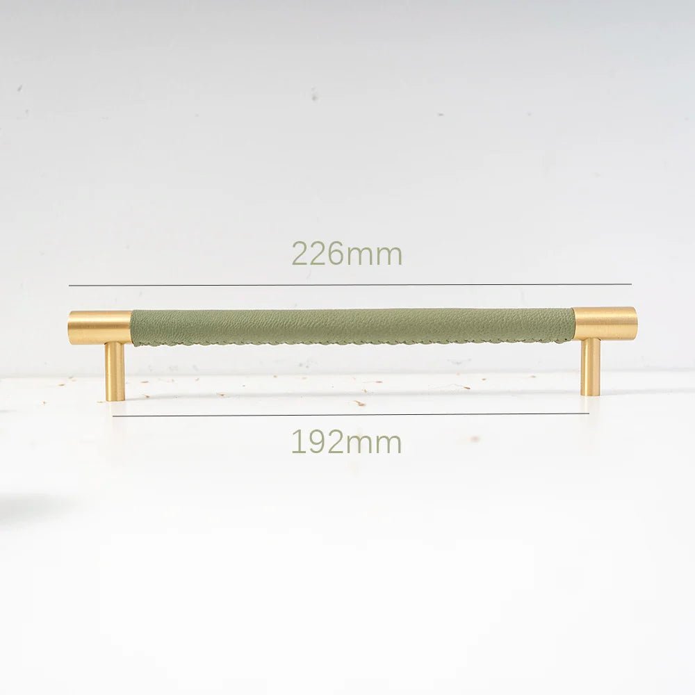 Unique green leather and brass handles for cabinets