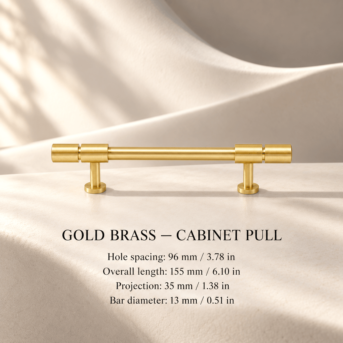GOLD BRASS cabinet pull in ivory studio. Hole spacing: 96 mm / 3.78 in; Overall length: 155 mm / 6.10 in; Projection: 35 mm / 1.38 in; Bar diameter: 13 mm / 0.51 in.
