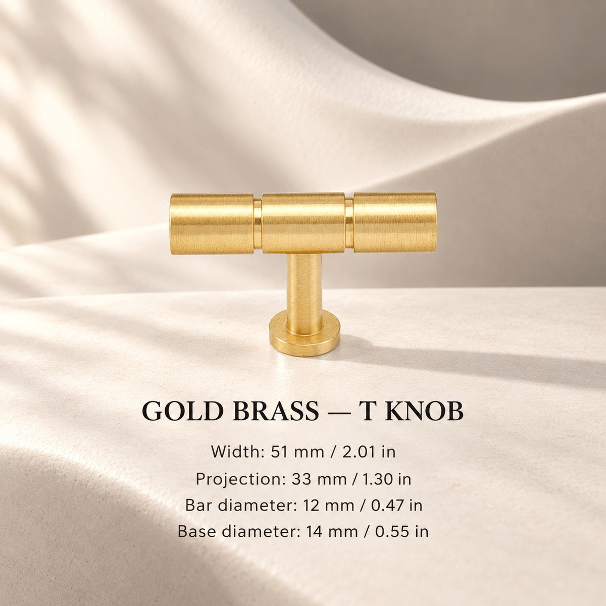 GOLD BRASS T-knob in ivory studio. Width: 51 mm / 2.01 in; Projection: 33 mm / 1.30 in; Bar diameter: 12 mm / 0.47 in; Base diameter: 14 mm / 0.55 in.