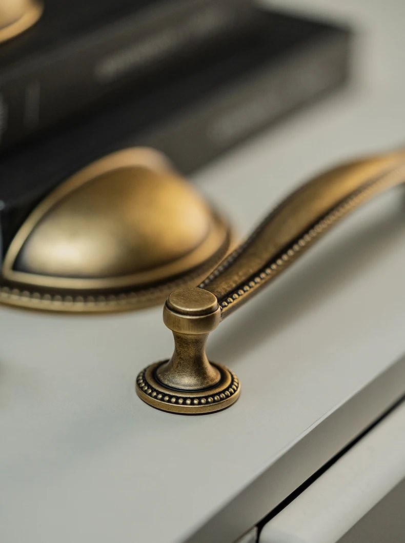 Sleek Shell-Shaped Brass Knobs for Vintage Cabinet Pulls