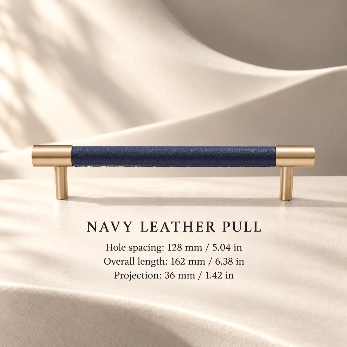 Navy leather cabinet pull, 128 mm CTC — individual measurements in millimeters and inches