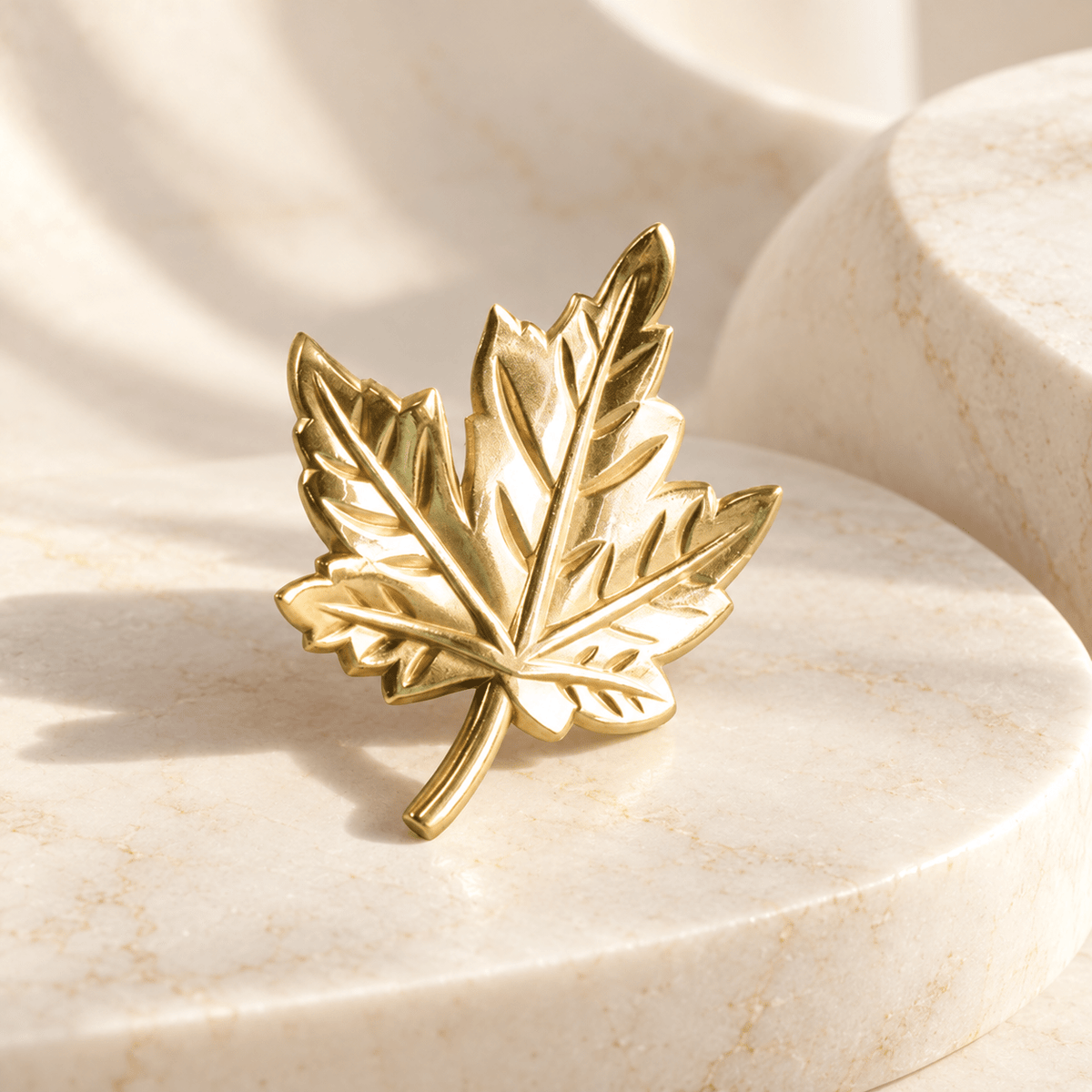 Gold brass maple leaf cabinet knob, left version, ivory stone studio