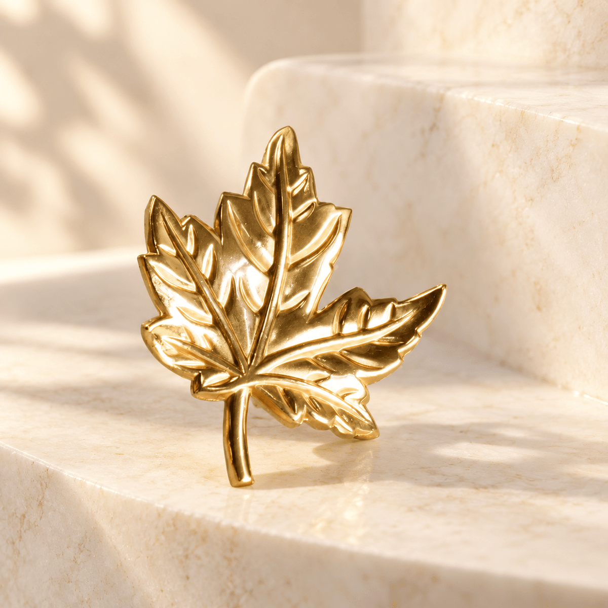 Gold brass maple leaf cabinet knob, right version, ivory stone studio