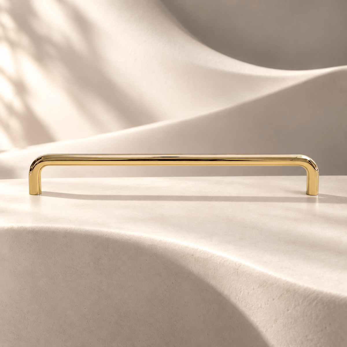 Polished gold U pull, 224 mm CTC — warm ivory stone studio