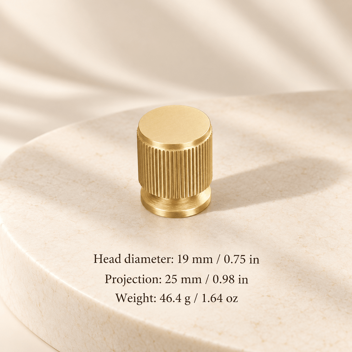 Gold knob — 19 mm / 0.75 in diameter; Head diameter: 19 mm / 0.75 in; Projection: 25 mm / 0.98 in; Weight: 46.4 g / 1.64 oz on ivory stone studio background