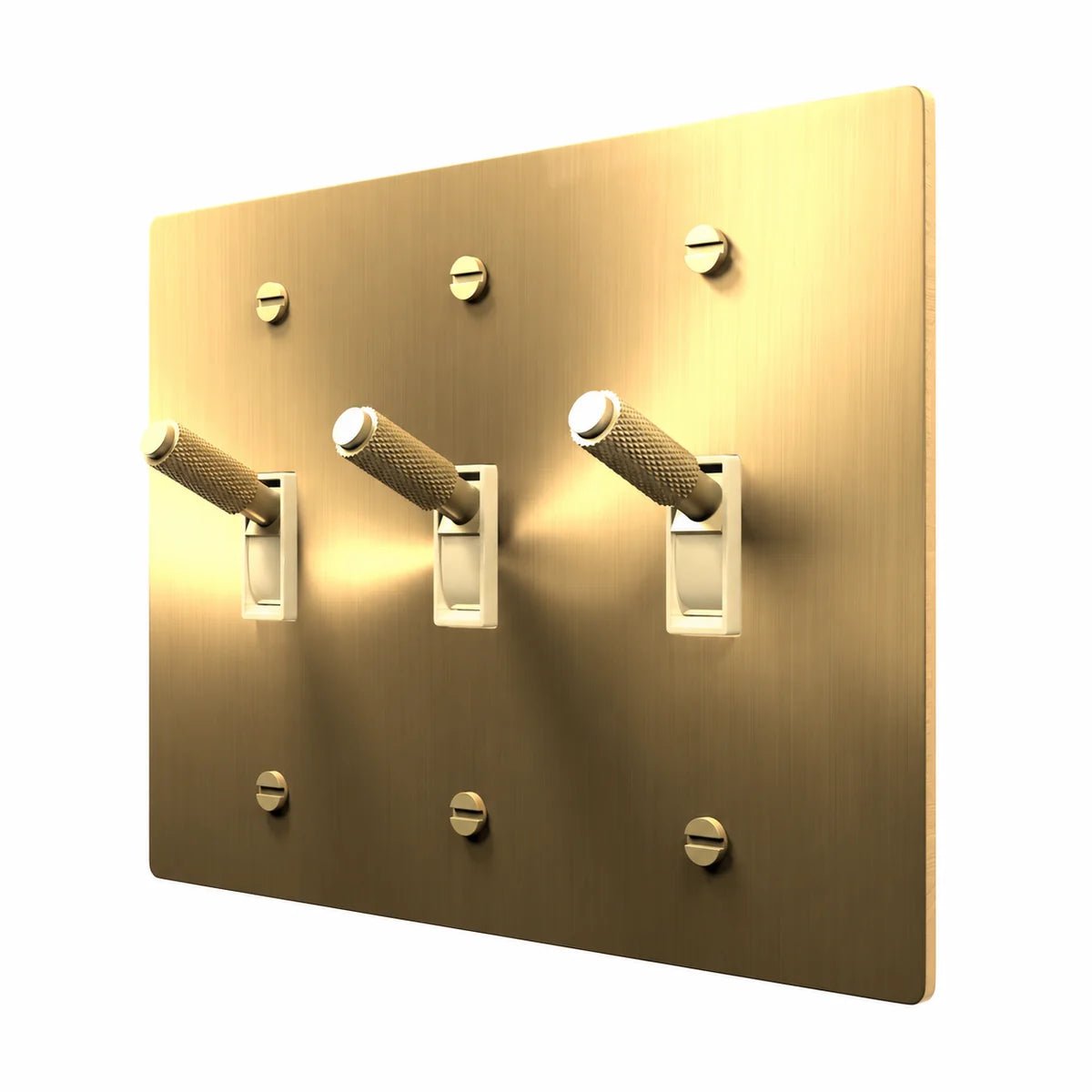 PlatePrestige Brass Toggle Switch 3-Gang in Brass with ivory toggle frames, angled view