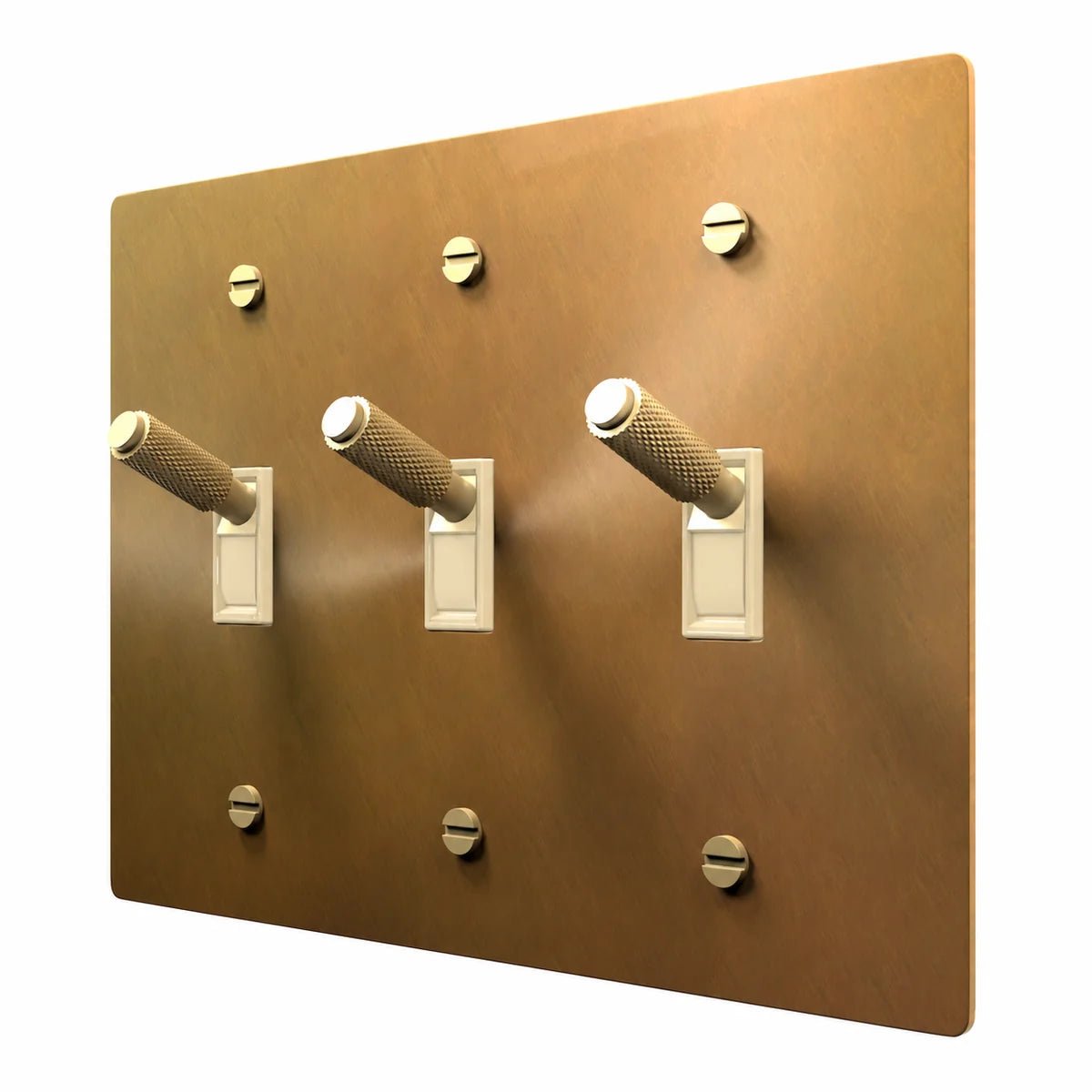 PlatePrestige Brass Toggle Switch 3-Gang in Unlacquered Aged brass with ivory toggle frames, angled view
