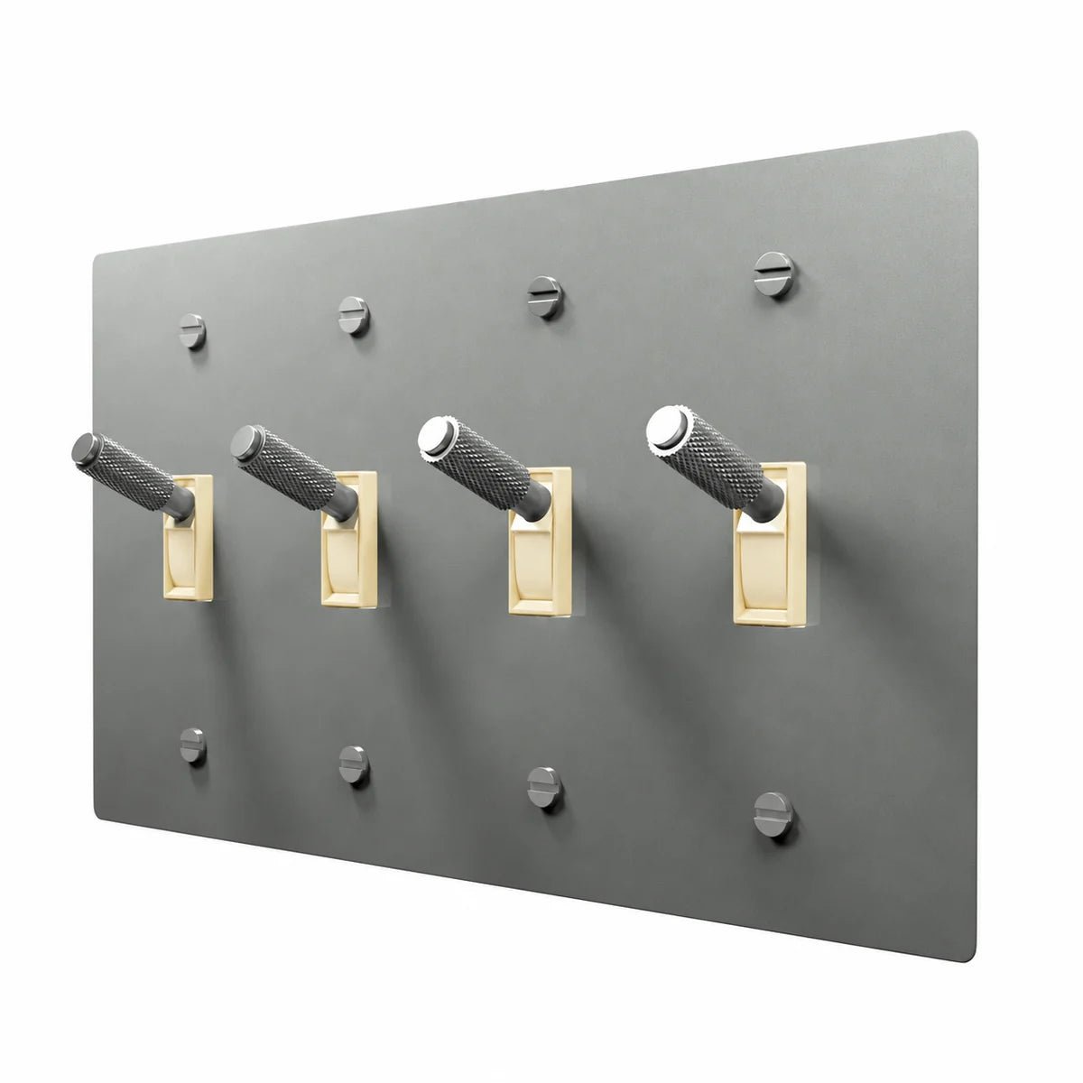 PlatePrestige Brass Toggle Switch 4-Gang in Stainless Steel with ivory toggle frames, angled view