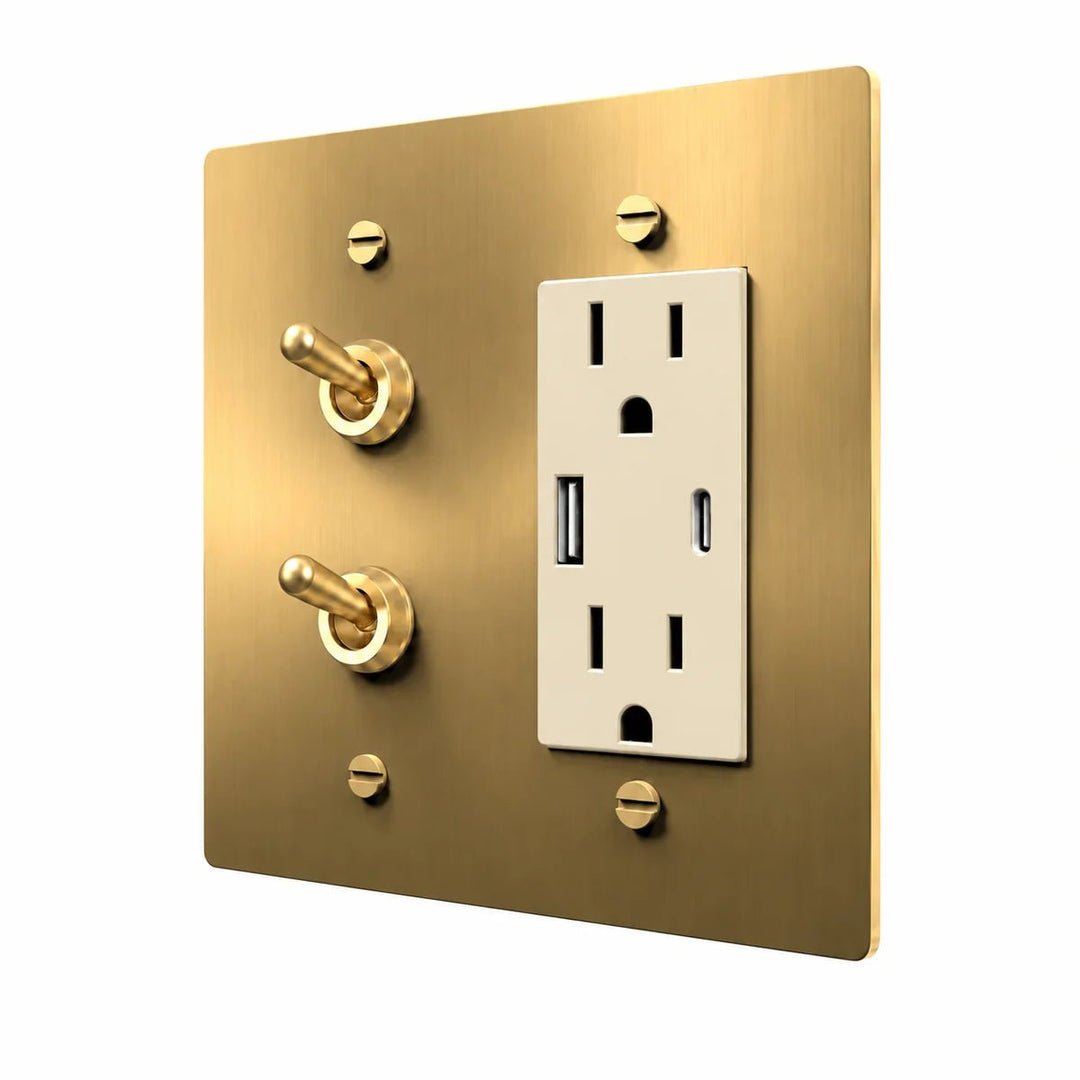 Brass Stacked Retro Toggle & Outlet Combo Switch Plate in Brass with ivory outlet inserts, angled view