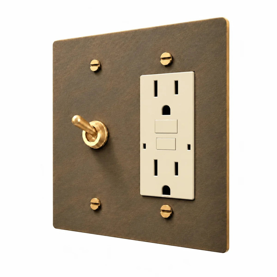 Brass Retro Toggle & Outlet Combo Switch Plate in Aged Brass with ivory outlet inserts, angled view