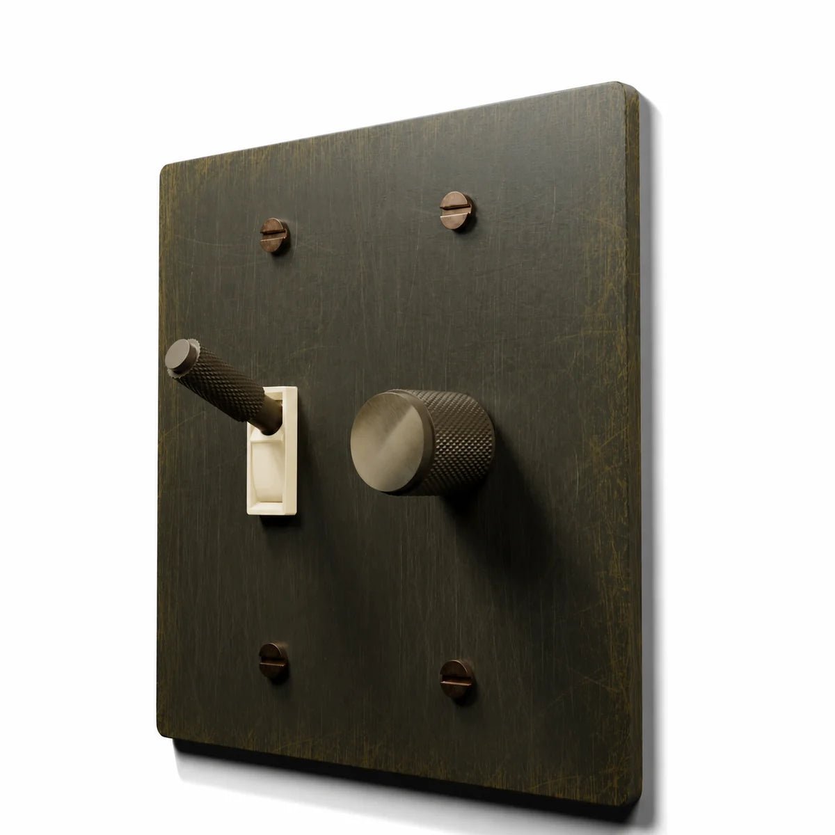 Brass Toggle & Dimmer Combo Switch Plate in Antique Brass with ivory toggle frames, angled view