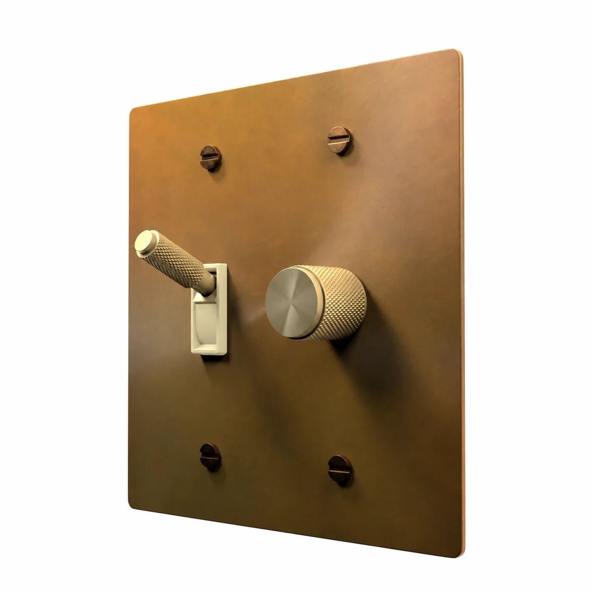 Brass Toggle & Dimmer Combo Switch Plate in Unlacquered Aged brass with ivory toggle frames, angled view
