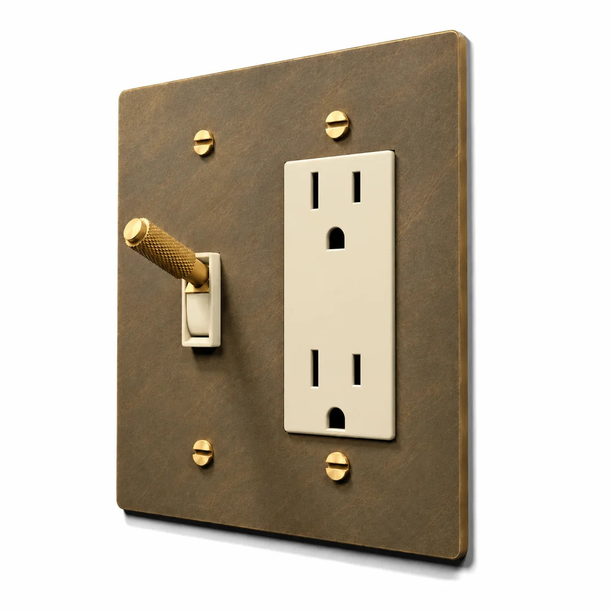 Brass Toggle & Outlet Combo Switch Plate in Aged Brass with ivory toggle frames and outlet inserts, angled view