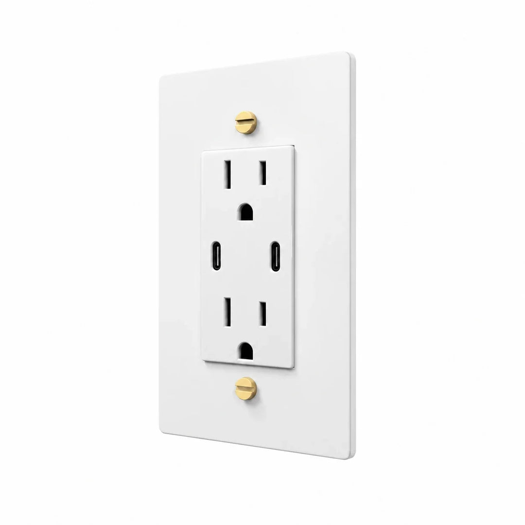 Angle view of PlatePrestige dual USB-C electrical outlet, white / brass wall plate with white receptacle and coordinated screws