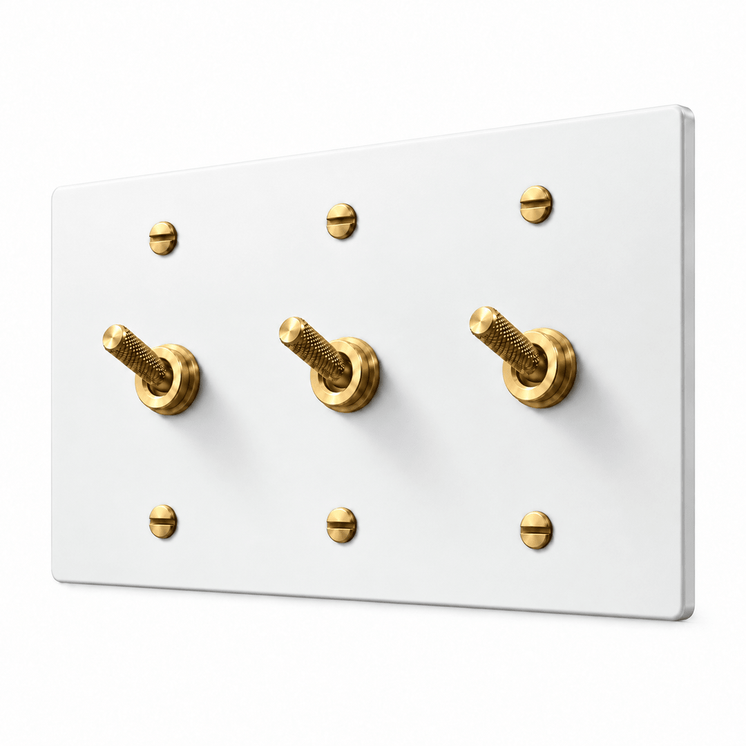 PlatePrestige 3-gang Knurled Toggle Light Switch in White / Brass