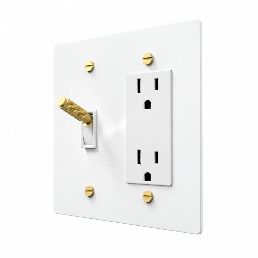 White wall plate with brass toggle and screws and regular duplex outlet – PlatePrestige