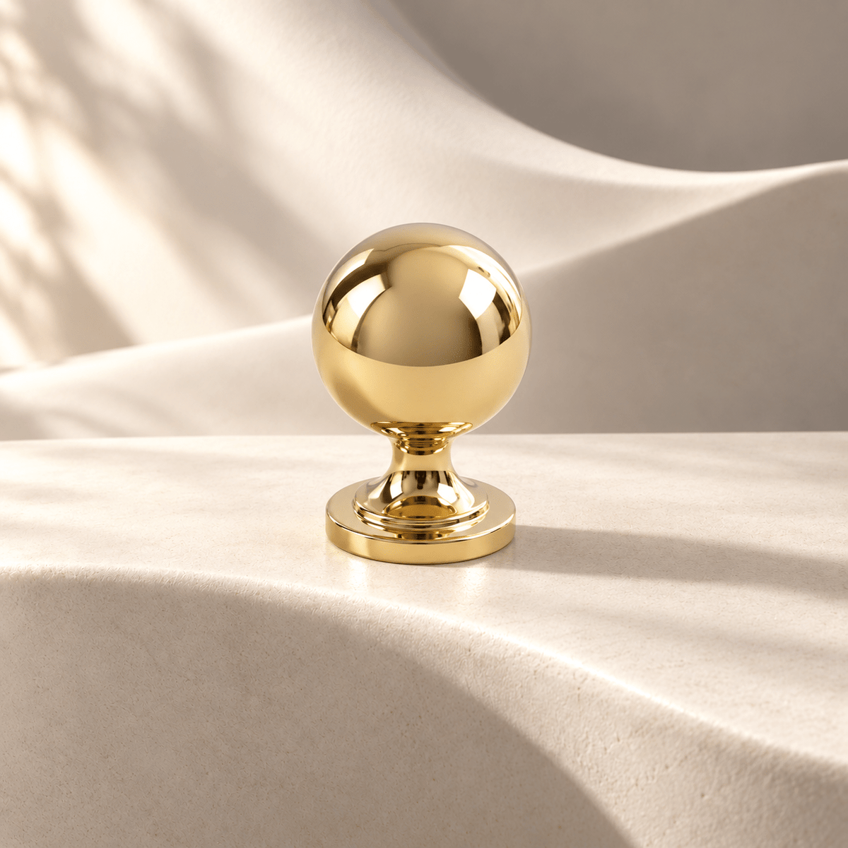 Gold 26 mm pedestal cabinet knob — warm ivory studio