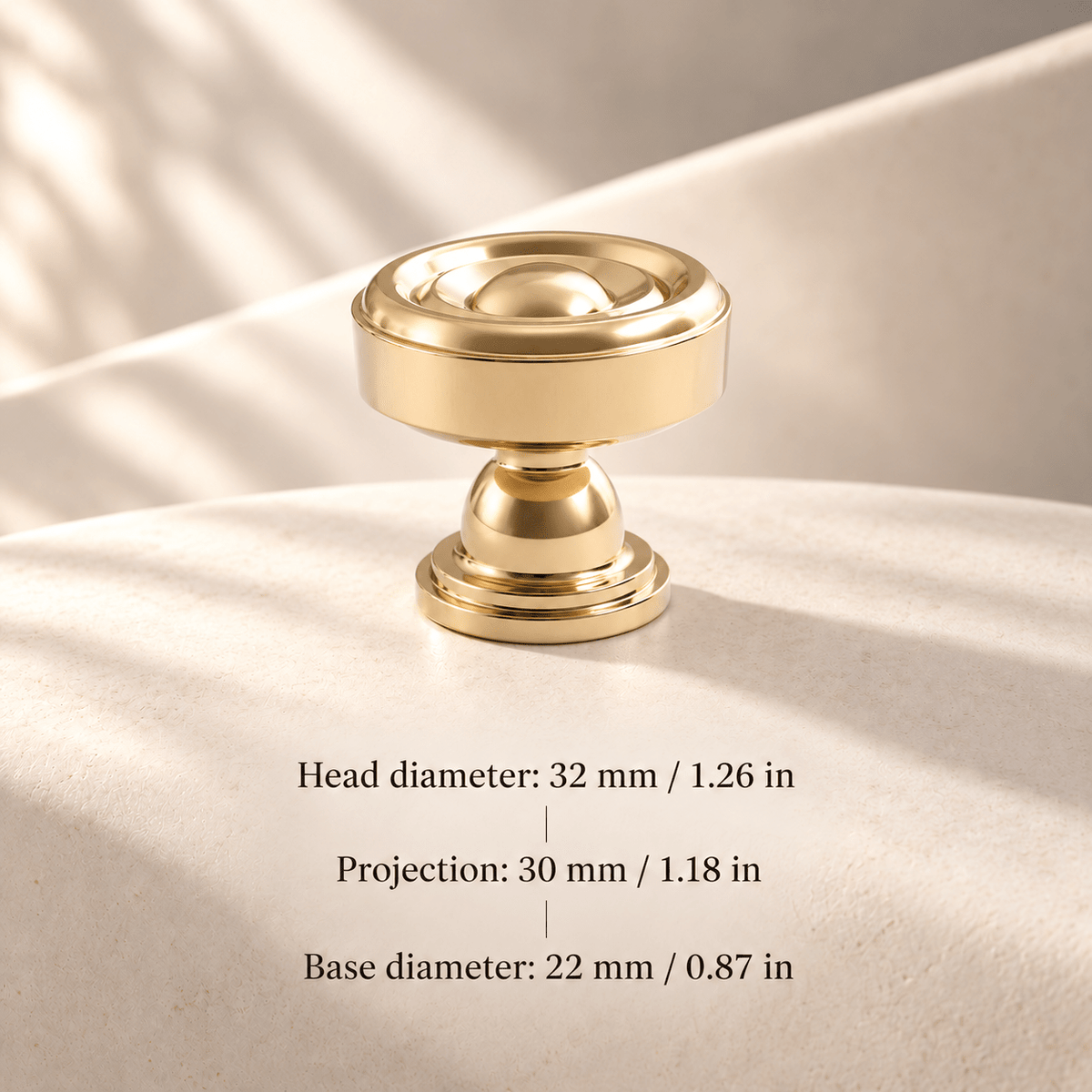 Polished gold ring knob in ivory studio. Head diameter: 32 mm / 1.26 in; Projection: 30 mm / 1.18 in; Base diameter: 22 mm / 0.87 in