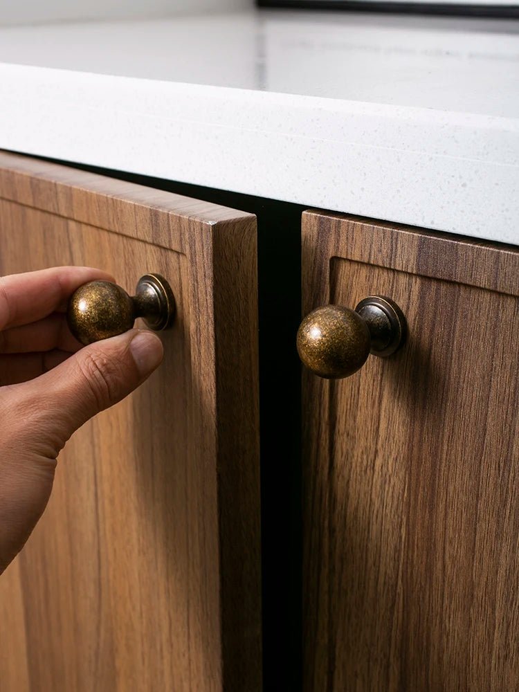 Sleek Spherical Antique Brass Drawer Knob for Cabinet Design